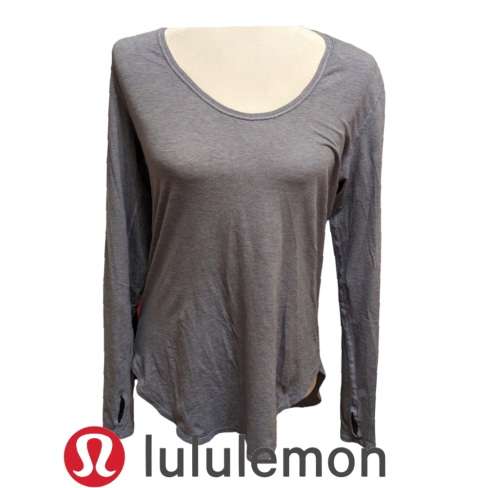 - Lululemon long sleeved, cover your butt design. Lt Blue. Size 8 EUC